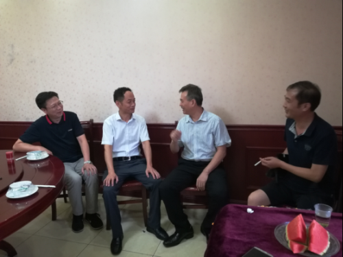 宜都市侨联看望回乡探亲华裔孔晓峰